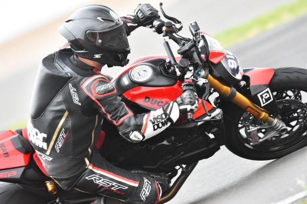 a motorcycle making its way through a corner