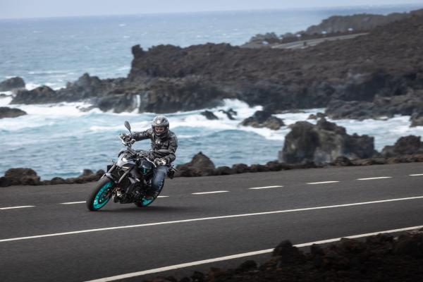 A motorcycle going around a corner