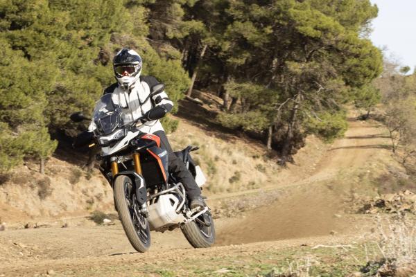 Power sliding a motorcycle on a dirt track