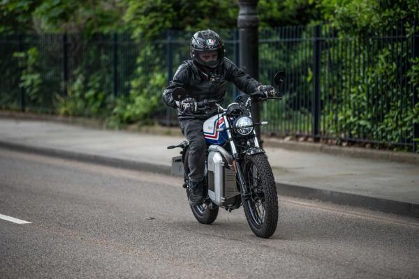 A motorcycle riding along a road