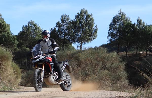 Power sliding a motorcycle on a dirt track