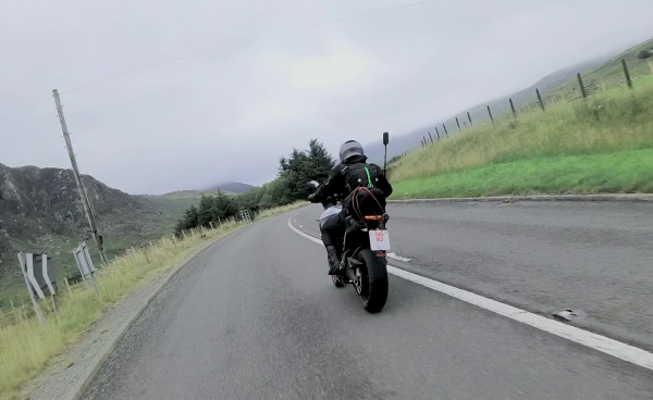 an electric motorcycle heading into a corner