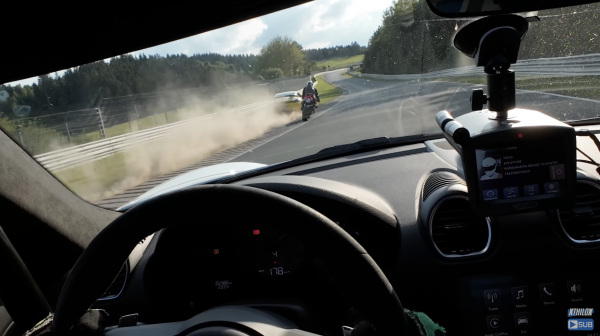 A Porsche driver runs off the track at the Nordschleife